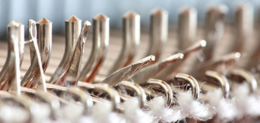 detail of working knitting machines