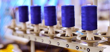 detail of working knitting machines